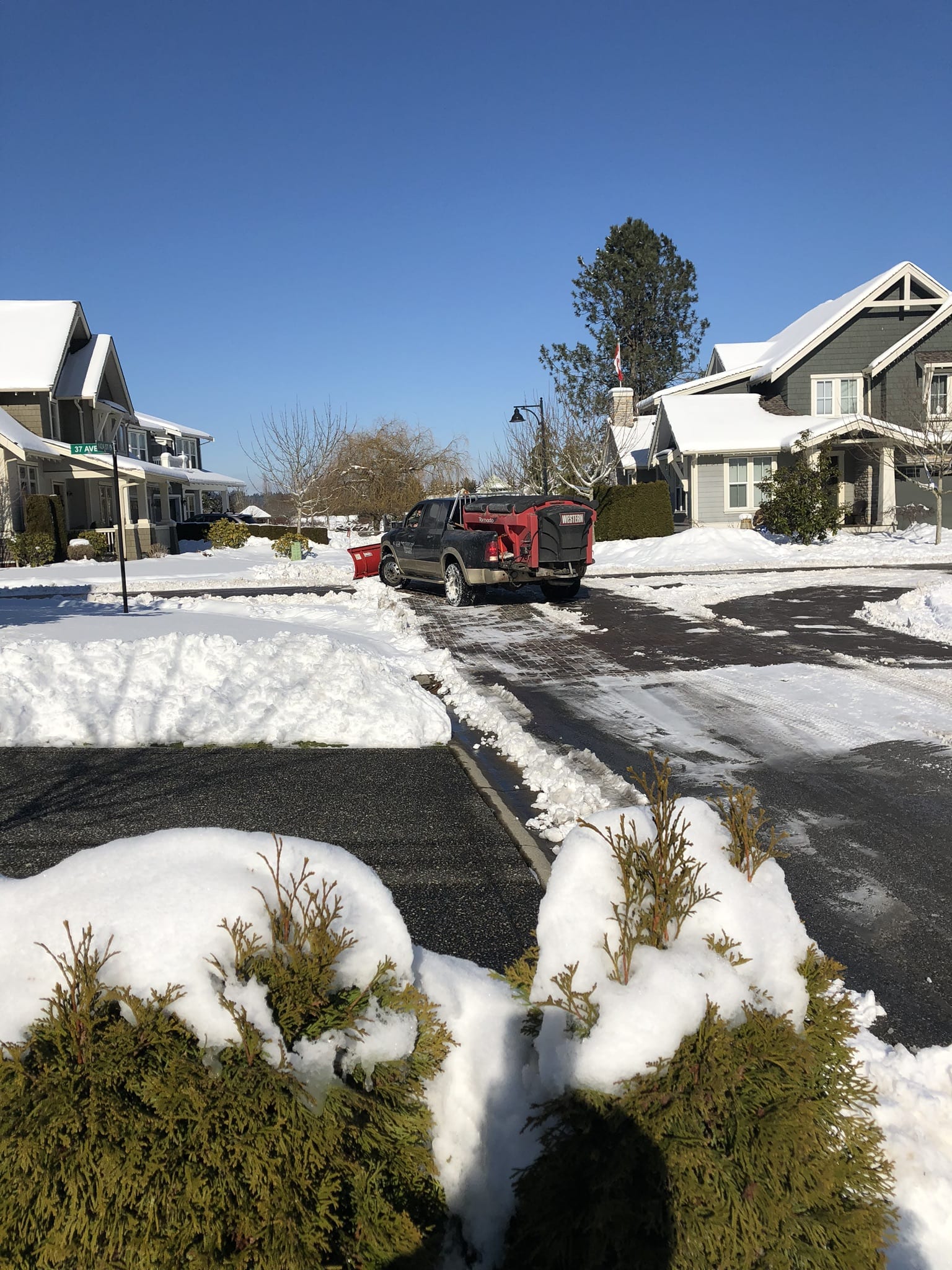 Removed Snow for Pitt Meadows home driveway and walkway in front their house