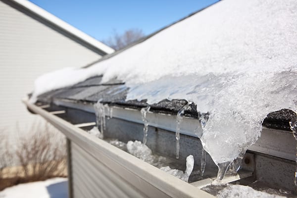 lots of snow and ice on your home roof